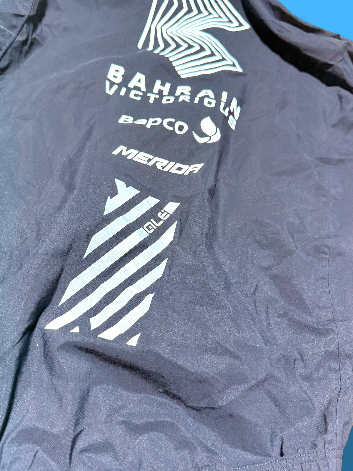 Black Lightweight Packable Rain Jacket | Bahrain Victorious | Alé Pro Cycling Kit